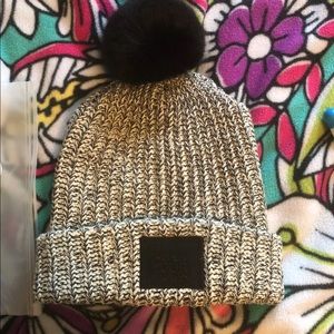 Kids Love Your Melon cuffed pom hat